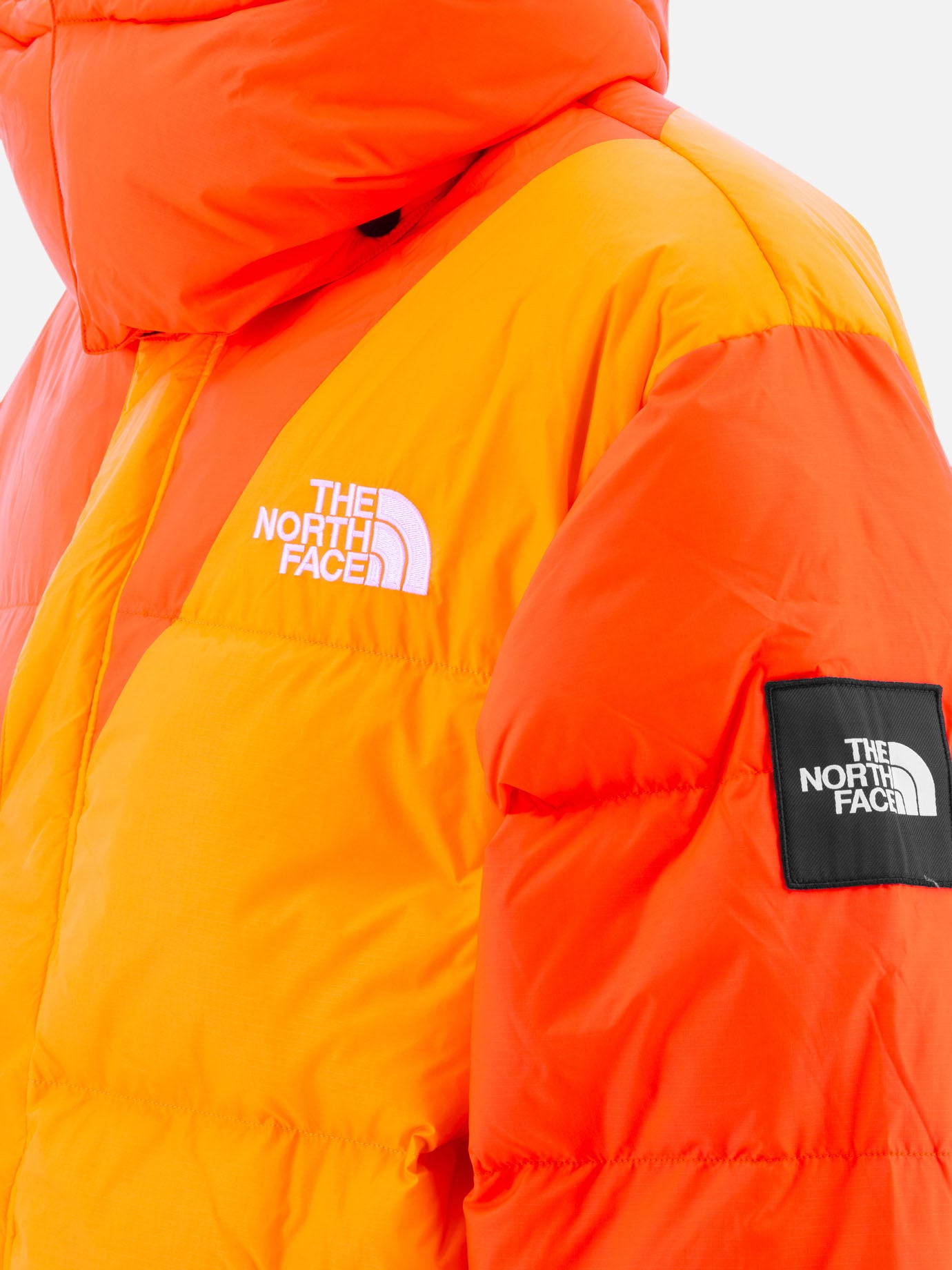 The North Face "TNF x Yinka Ilori" down jacket Orange